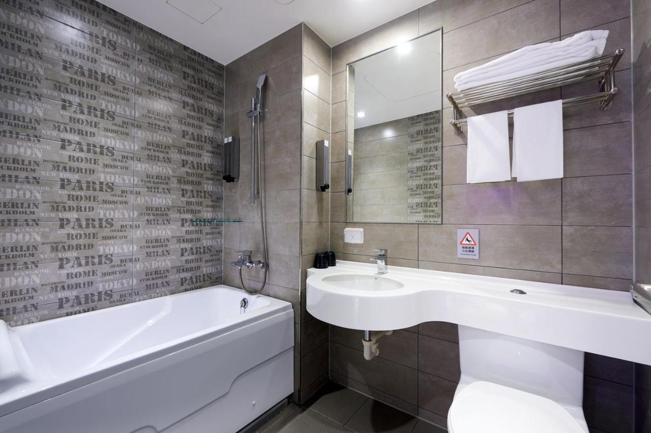Kiwi Share Hotel Чжунли Экстерьер фото